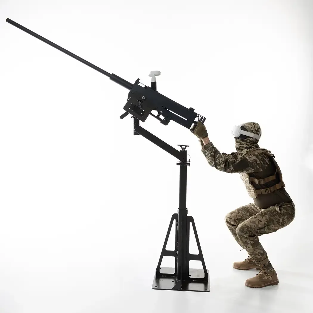 Multimedia trainer for air defense machine gun based on a Browning M2 model and VR technologies